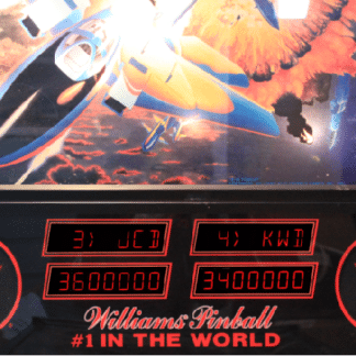 A close up of the williams pinball machine
