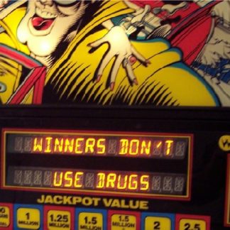 A close up of a sign with the words " winners don 't use drugs ".
