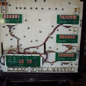 A close up of the back side of an old computer