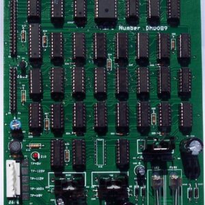 A green board with many different electronic components.