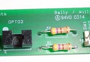 A green board with two yellow and white resistors.