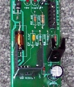 A circuit board with many different electronic components.