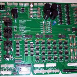 A green board with many different electronic components.