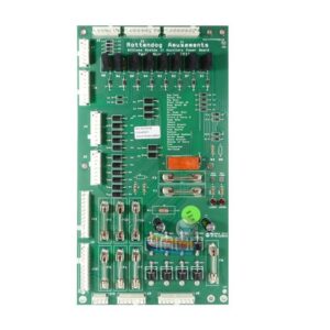 A green board with many wires and buttons