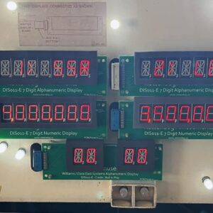 A group of electronic displays with numbers on them.