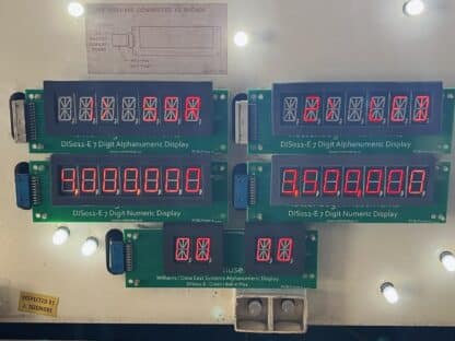 A group of electronic displays with numbers on them.